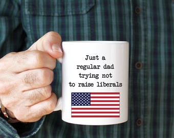 Just a regular dad trying not to raise liberals coffee mug - patriot
