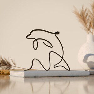 Figura de delfín - Escultura minimalista de cría
