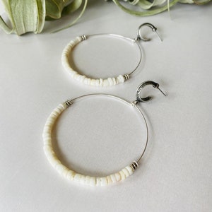 Puka shell hoop earrings image 1