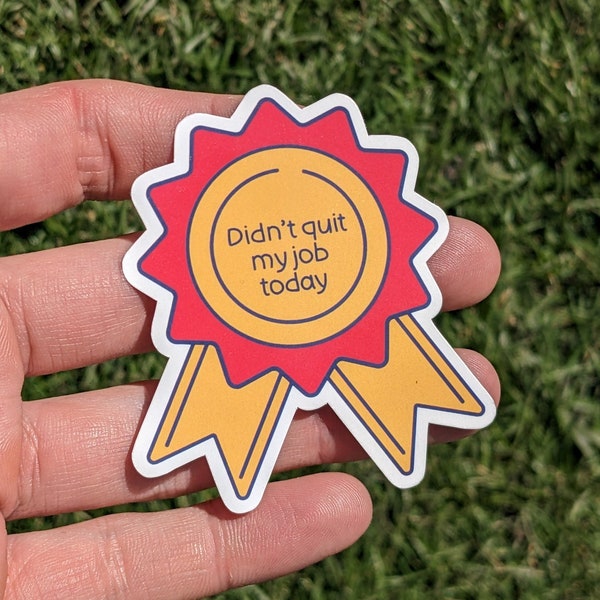 Daily Victory: "Didn't Quit My Job Today" Ribbon Sticker - Funny, Motivational Vinyl Decal for Laptops, Water Bottles, Planners