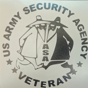 May include: Black and white sticker with the text "US Army Security Agency Veteran" in a circle around two figures wearing hats and coats. The text "ASA" is in the center of the sticker.