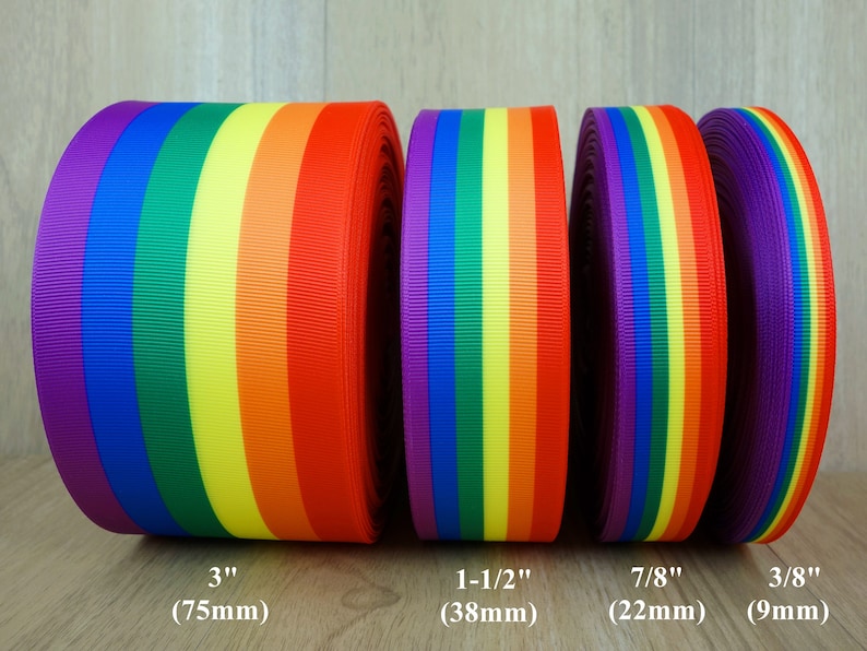 May include: Four rolls of rainbow ribbon in different widths: 3 inches (75 mm), 1-1/2 inches (38 mm), 7/8 inches (22 mm), and 3/8 inches (9 mm).