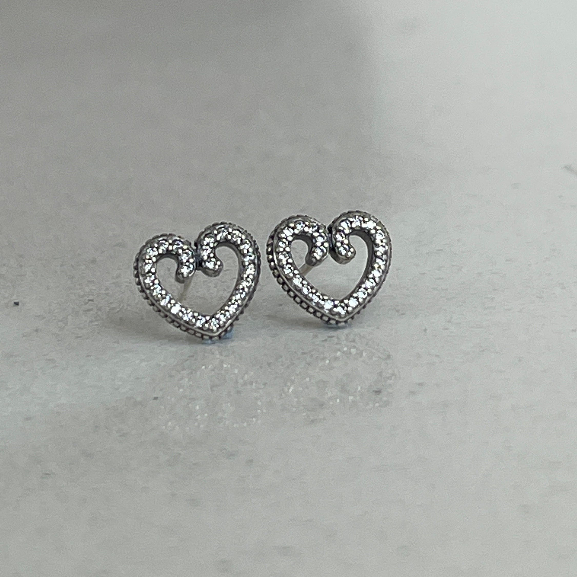 Pandora heart swirl earrings deals