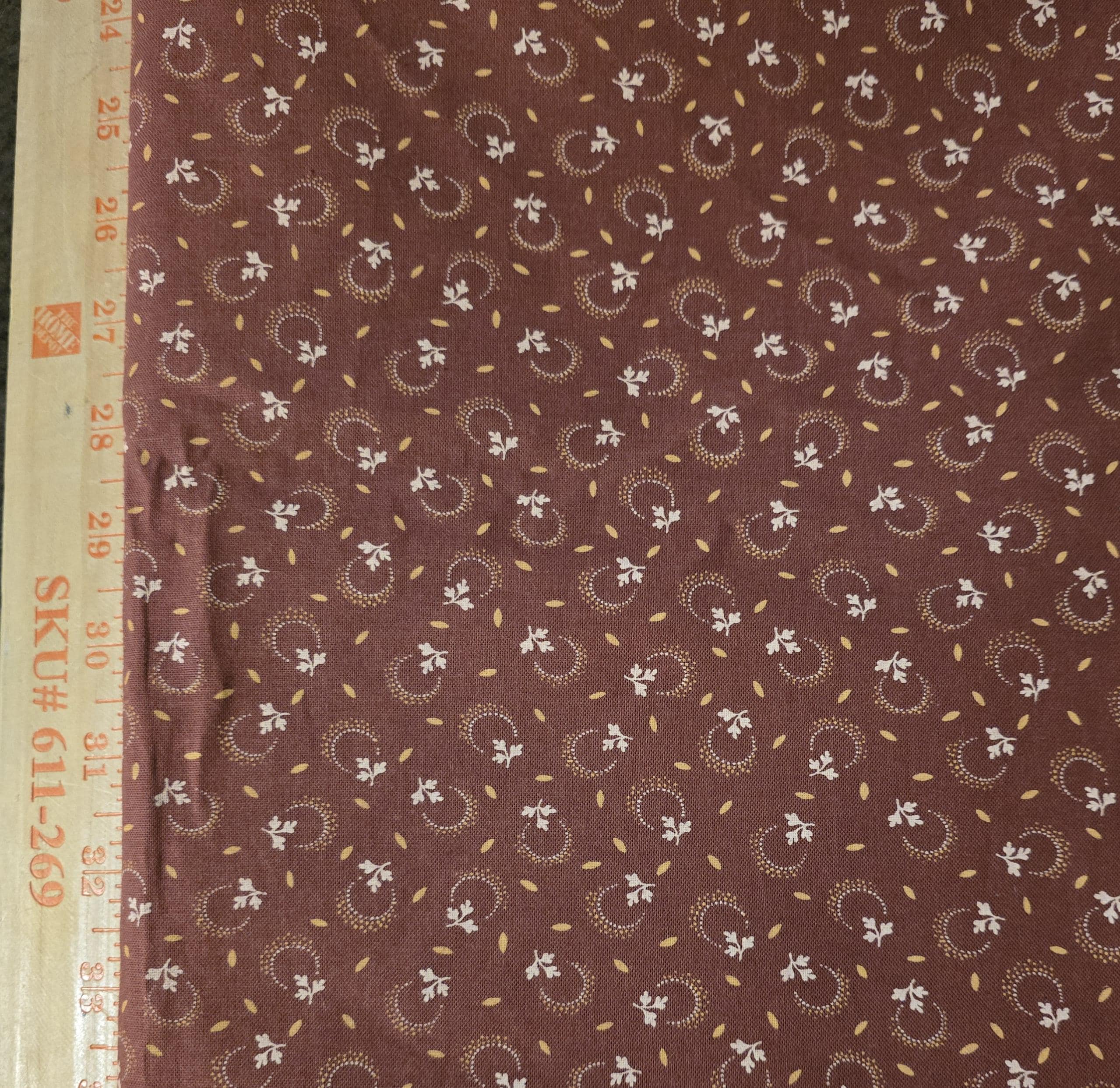Hearth and Home Fabric by Country Essentials. White Leafy Motif on Rust Background. Civil War Reproduction Sold by the Half Yard