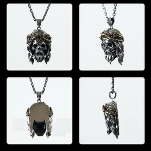 May include: Silver pendant necklace featuring a detailed skull with a crown of thorns. The pendant is shown from four different angles.
