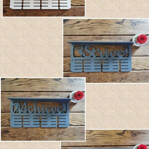 May include: Four different medal display shelves with a dancer silhouette and the words "Hannah", "Strive", "Achieve", and "Accomplish". Each shelf has 12 slots for medals.