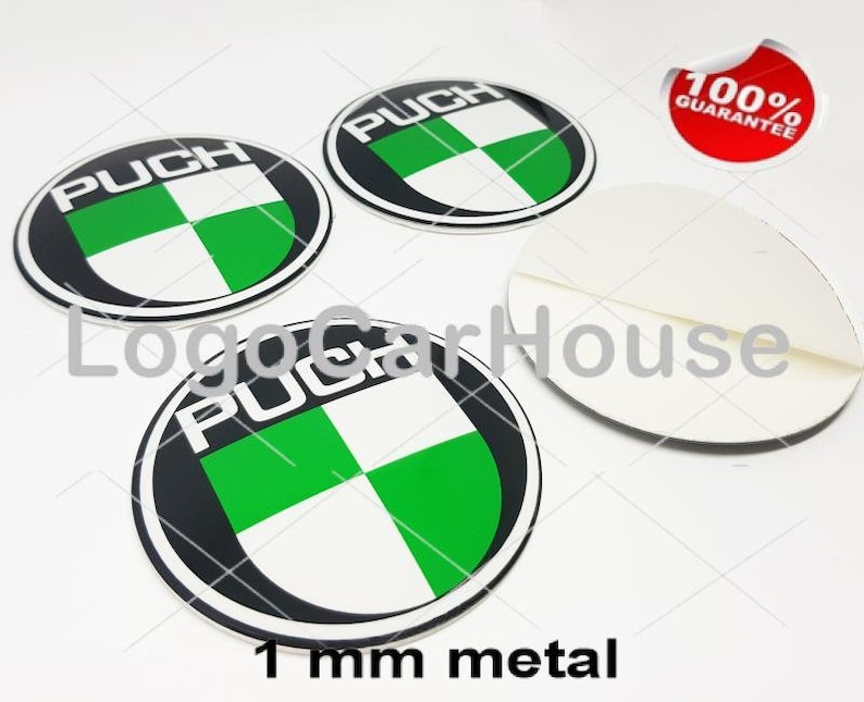 May include: Four round, black, white, and green metal stickers with the word "PUCH" in white. The stickers have a green and white checkered design. A red sticker with "100% GUARANTEE" is also visible. The text "1 mm metal" is at the bottom.