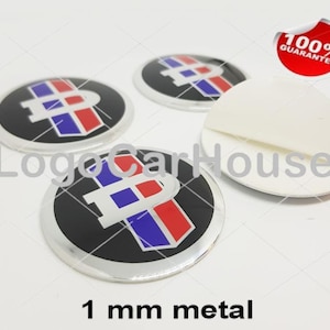 Metal Stickers - car wheel center cap stickers - set of 4 - DATSUN 7