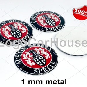 May include: Four 1 mm metal car emblems with a black and red design. The emblems feature a crest with a shield and the text "Austin Healey Sprite".
