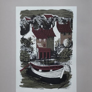 May include: A black and white illustration of a small boat docked in front of a group of houses. The houses have red roofs and are surrounded by trees. The illustration is in a vintage style and has a green background. The text "JANUARY 1952" is at the bottom of the image.