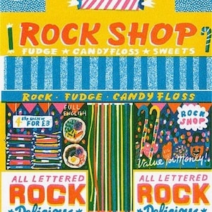 May include: A yellow and blue illustrated storefront with the text "Rock Shop" and "Fudge Candyfloss Sweets". The shop sells rock candy, fudge, candy floss, and ice cream. The sign says "All lettered Rock Delicious Ice Cream".