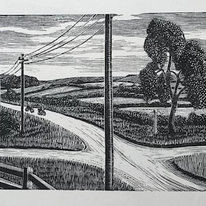 May include: A black and white woodcut print depicting a rural landscape with a winding road, telephone poles, and a lone tree. The road leads to a fork in the road, with one path leading into the distance and the other leading to a field.
