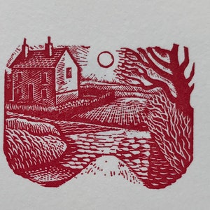 May include: A red woodcut illustration of a house with a chimney, a tree, and a moon in the sky. The house is in the foreground, and the tree is in the background. The moon is in the upper right corner of the image.