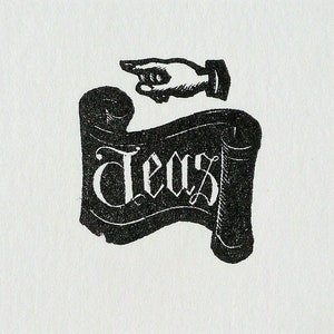 May include: Black and white illustration of a scroll with the word "Text" written on it. A hand points to the scroll.