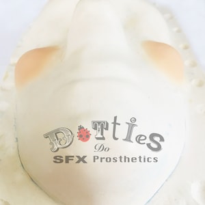 Pair of Unpainted Silicone Botched cheeks / implant / plastic surgery