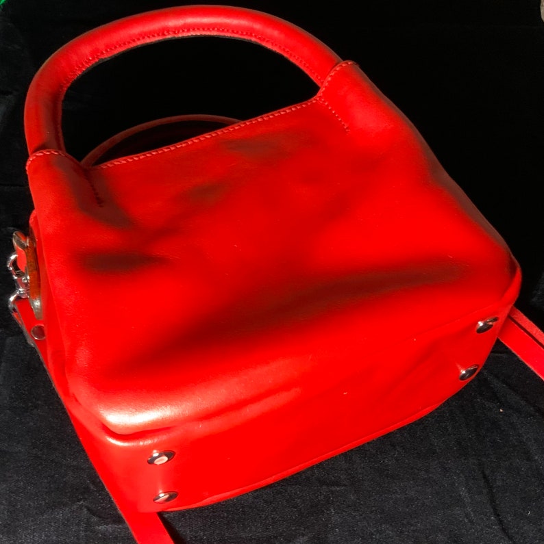 red color double inner pocket with zip and detachable strap Small clutch bag in real leather