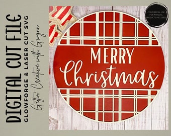 May include: Red and white checked circle with the text "Merry Christmas" in white. The circle is on a white wood background.