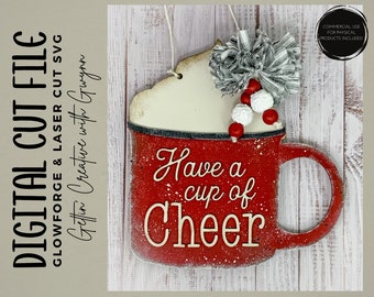 May include: Red and white wooden mug with a white fluffy top and red and white beads. The mug says "Have a cup of Cheer".