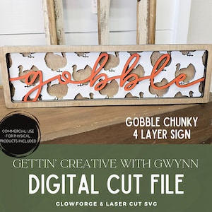 May include: A digital cut file for a four-layer "Gobble Chunky" sign featuring a turkey pattern and the word "gobble" in orange. The sign is perfect for Thanksgiving decor.