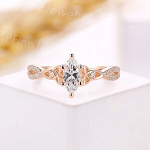Marquise moissanite engagement ring celtic style ring round diamond ring rose gold twist ring unique pave anniversary promise ring