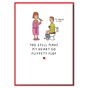 May include: A humorous greeting card featuring a cartoon illustration of a woman in a pink dressing gown and a man sitting on the toilet. The text reads "I'm having a poo." and "You still make my heart go plippety plop."