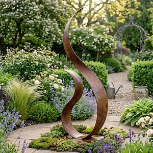 May include: A large, abstract metal sculpture with a curved, flame-like design. The sculpture is a rusty brown color and is set in a lush garden with various plants and flowers. The garden path leads to a decorative archway.