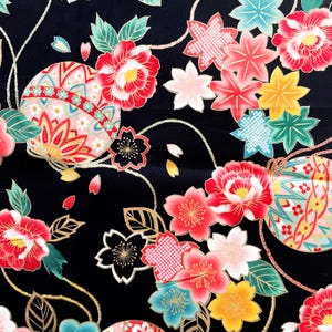 May include: Black fabric with a repeating pattern of pink, red, and gold flowers, leaves, and geometric shapes. The fabric features a traditional Japanese design.