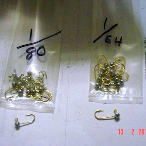 12 pack 1/80,1/64,1/32,1/16,1/8,1/4, oz jig heads no collar 570 Eagle Claw hooks.