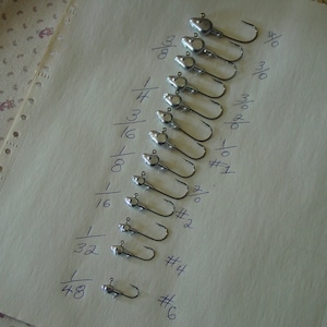 12 Minnow Head Jigs on Bronze 570 Eagle claw Hooks You Choose size & oz..