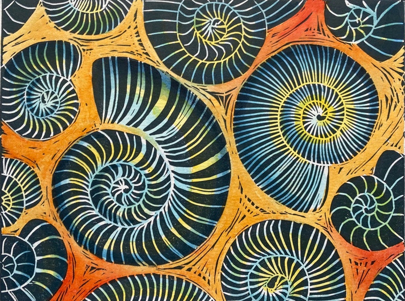 Whitby Ammonites Handmade,limited edition Linocut print Deep orange background.