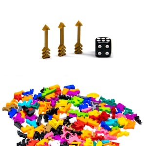 May include: A pile of colourful plastic game pieces, including red, blue, green, yellow, orange, and purple. Three gold arrows point to the right, and a black die with white dots sits in the centre.
