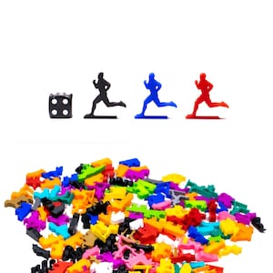 May include: A black, blue, and red running figure game pieces with a black die. A large pile of colorful plastic game pieces in various shapes and colors.