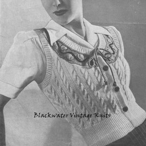 May include: Black and white photo of a woman wearing a white knitted vest with a decorative collar and buttons. The vest is made with Emu Unshrinkable Wools. The text "Blackwater Vintage Knits" is at the bottom of the image.