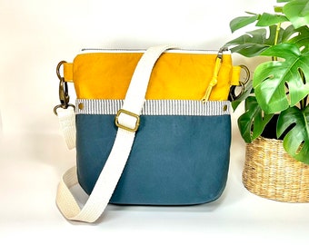 Waxed Oilskin Canvas Crossbody Bag, dark blue and mustard handsfree travel bag, Easton Crossbody Bag, multi-pocket, adjustable crossbody bag