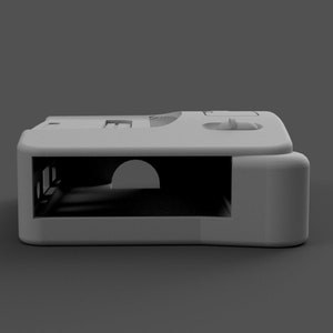 May include: A white plastic case with a rectangular opening and a small, round opening on the top. The case is designed to hold a small electronic device.