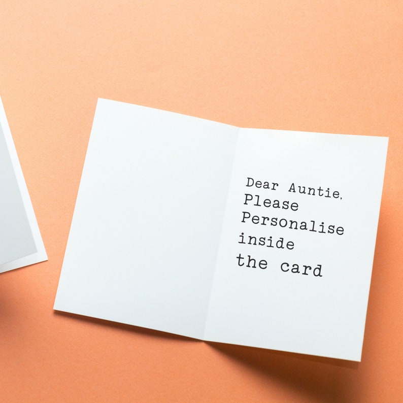 May include: A white card with the text "Dear Auntie. Please Personalise inside the card" printed on it.