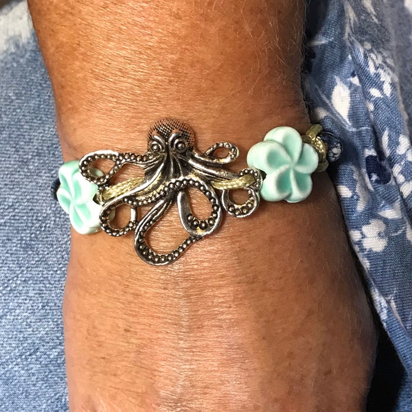 Sterling silver plated Octopus charm bracelet .  Adjustable 7” braided 95 anklet/ bracelet in choice of colors.  Chunky stone and natural