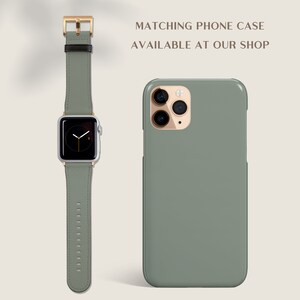 May include: A green phone case with a gold camera lens and a matching green leather watch band with a gold buckle. The text "MATCHING PHONE CASE AVAILABLE AT OUR SHOP" is displayed above the image.