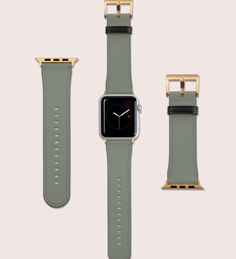 May include: A set of three watch bands in a light green color with gold hardware. The bands are made of leather and have a textured finish. The bands are compatible with Apple Watch.