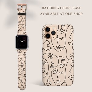 May include: A beige phone case with a black line drawing pattern of abstract faces. The case is shown next to a matching watch band with the same pattern.