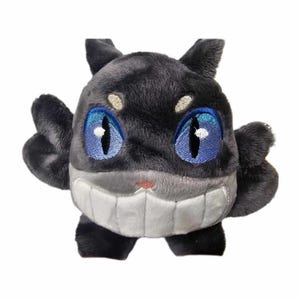 Wonderland&#39;s Enigmatic Companion: The Cheshire Cat Plushie