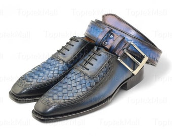 May include: A pair of blue leather shoes with a woven pattern and a matching blue leather belt with a silver buckle.