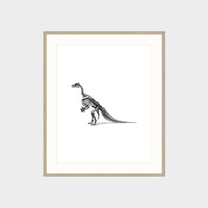 May include: Black and white line drawing of a dinosaur skeleton in a light wood frame.