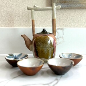 Rare, water well handle Japanese teapot with four tiny teacups in white, blue and maroon glaze. Hand glazed stoneware mini teapot. Signed on the bottom. Estate decor. Tea ceremony sets.