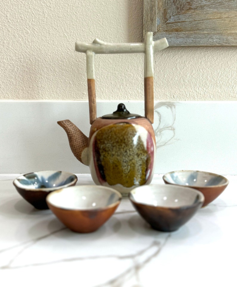 Rare, water well handle Japanese teapot with four tiny teacups in white, blue and maroon glaze. Hand glazed stoneware mini teapot. Signed on the bottom. Estate decor. Tea ceremony sets.