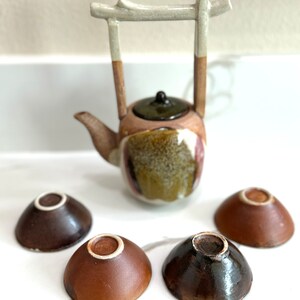 Rare, water well handle Japanese teapot with four tiny teacups in white, blue and maroon glaze. Hand glazed stoneware mini teapot. Signed on the bottom. Estate decor. Tea ceremony sets.