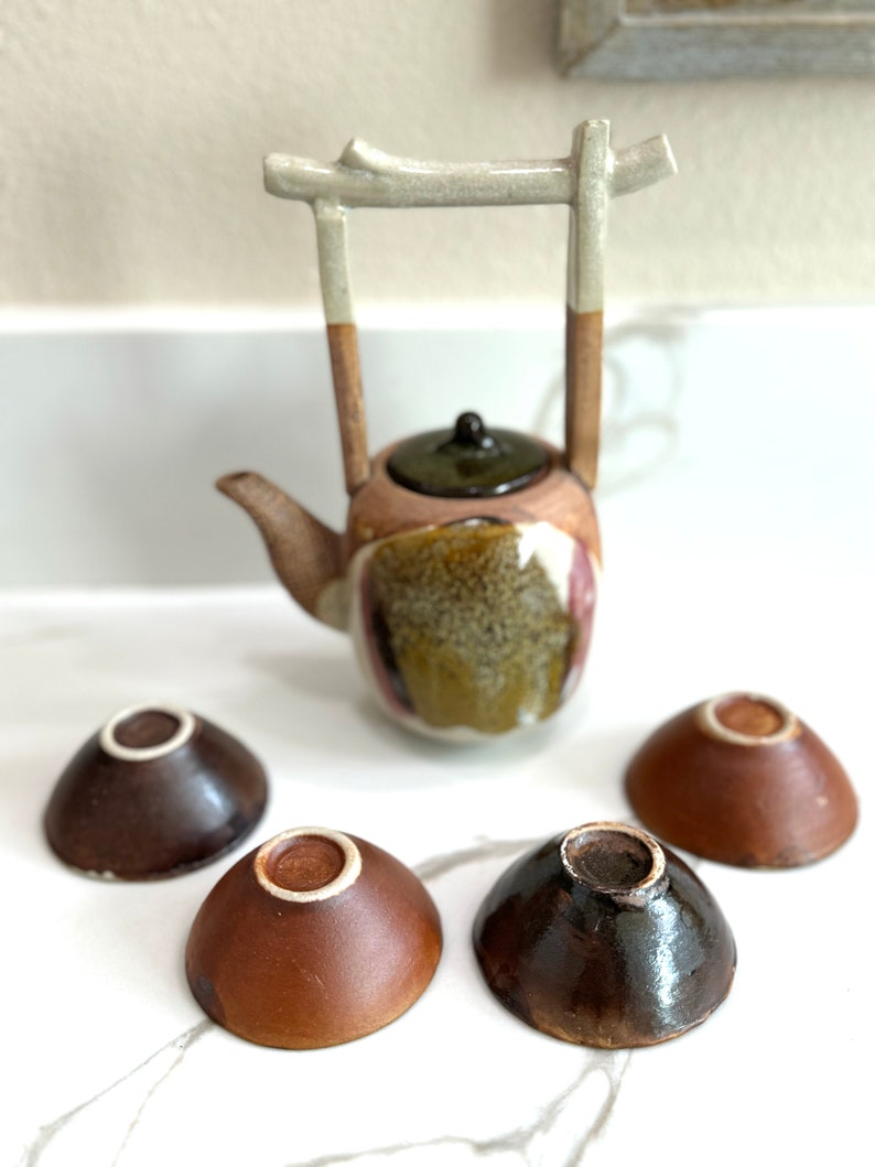 Rare, water well handle Japanese teapot with four tiny teacups in white, blue and maroon glaze. Hand glazed stoneware mini teapot. Signed on the bottom. Estate decor. Tea ceremony sets.