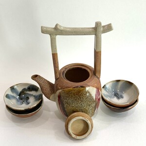Rare, water well handle Japanese teapot with four tiny teacups in white, blue and maroon glaze. Hand glazed stoneware mini teapot. Signed on the bottom. Estate decor. Tea ceremony sets.