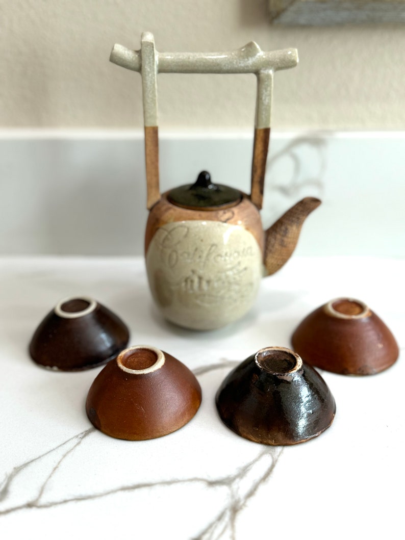 Rare, water well handle Japanese teapot with four tiny teacups in white, blue and maroon glaze. Hand glazed stoneware mini teapot. Signed on the bottom. Estate decor. Tea ceremony sets.