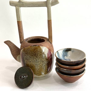 Rare, water well handle Japanese teapot with four tiny teacups in white, blue and maroon glaze. Hand glazed stoneware mini teapot. Signed on the bottom. Estate decor. Tea ceremony sets.